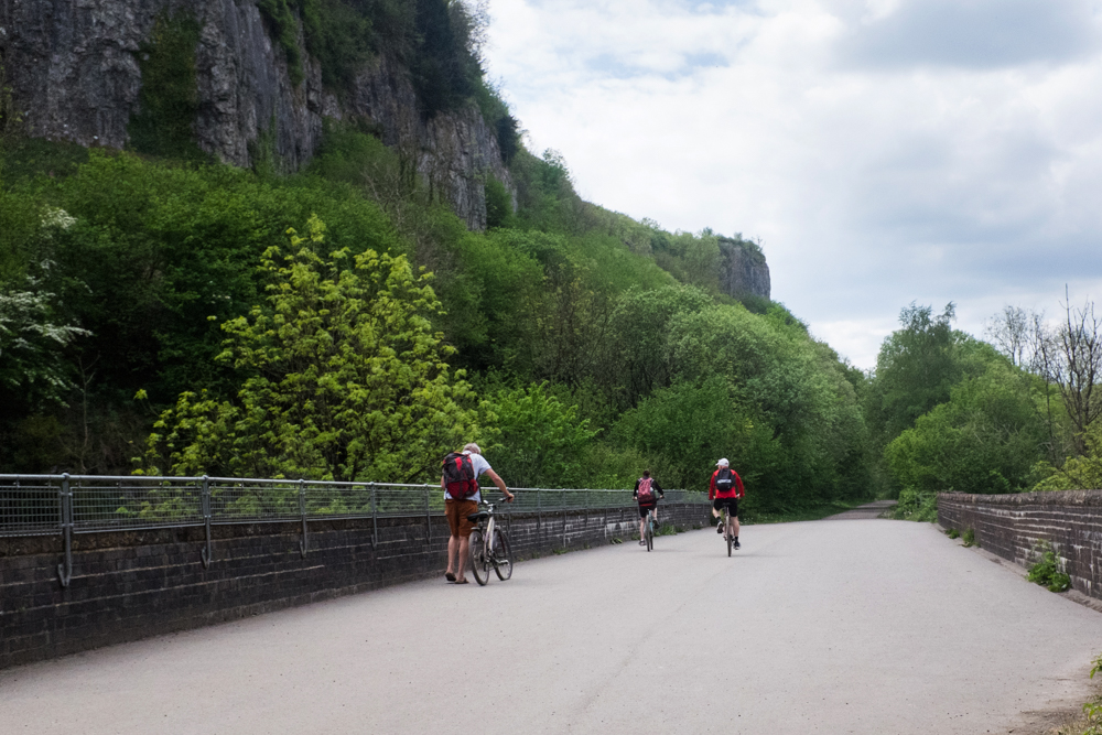 Cyclists on the Monsal Trail, a disused railway line in the UK's Peak District, now used as a leisure route by walkers, cyclists and horse riders